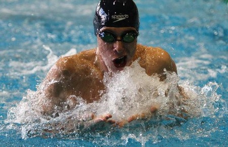 John Bing was the State Champion in the 50 Free and the 2014 Big 8 Male Swimmer of the Year.