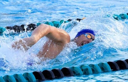 Freshman Drew Sipple won the 1650 Free at Big 8 Championships in a time of 16:22.58. Photo by Allen Kezer.