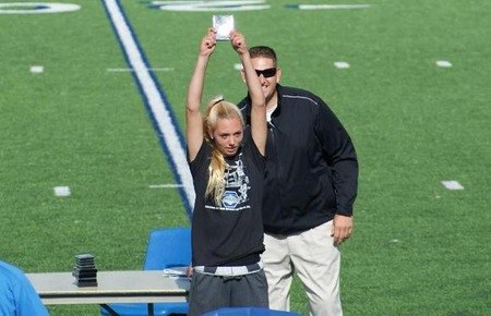 Julia Grimm finished 4th and received the All-American Award in the High Jump with a jump of 5'3.25" at the State Meet.
