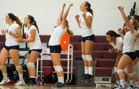 Bear Cubs celebrate after a kill against Sac City.